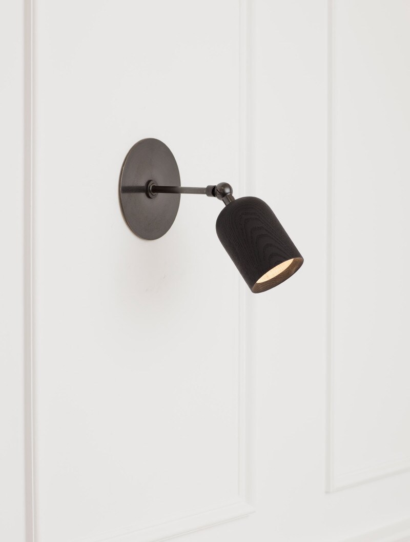 Leo Spotlight shown in Blackened Brass, Blackened Ash